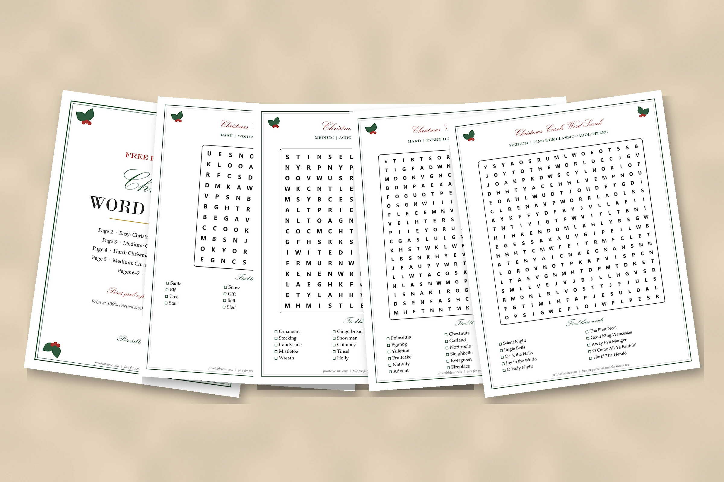 Five pages of free printable Christmas word search puzzles laid out on a table